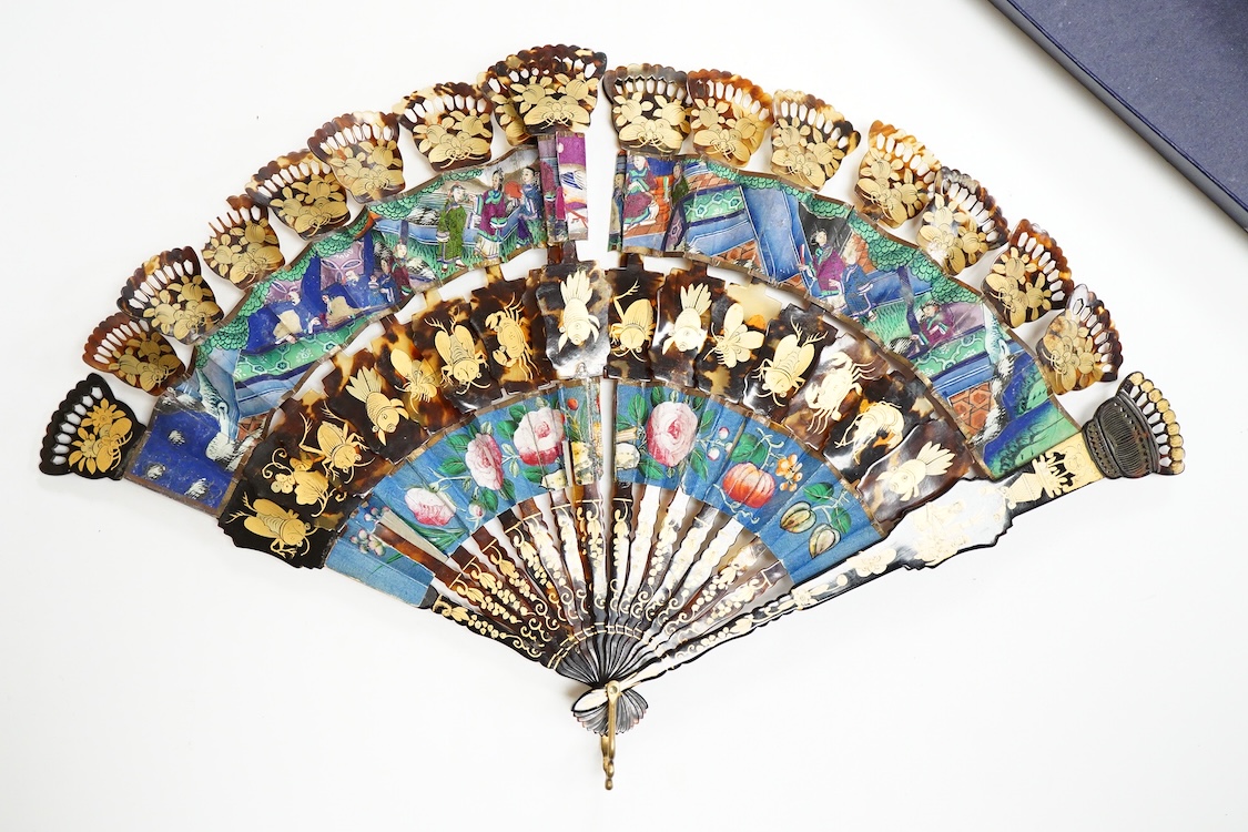 An unusual 19th century Chinese export gilt-decorated tortoiseshell and painted leaf fan, two English fans decorated with paper printed paper crests and a single sided Canton fan leaf lacking sticks, largest 23cm in leng